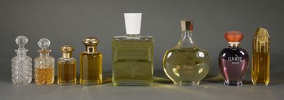 null Set of mismatched perfume bottles