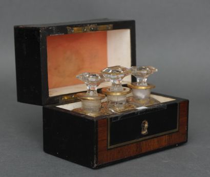  Perfume box in veneer and brass containing three gilded glass falcons, 19th century....