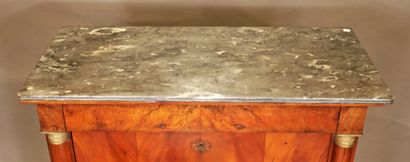 null A burr veneer desk with half columns and a grey marble top, 19th century.

H...