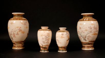 null Two pairs of earthenware baluster vases with polychrome and gilt decoration...
