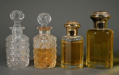 null Set of mismatched perfume bottles