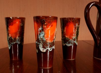 null 
*VALLAURIS




Orangeade service in ceramic with brown and orange engobe (chips)....