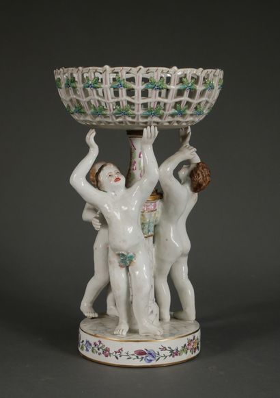 null *MEISSEN

Polychrome porcelain display stand decorated with three putti supporting...