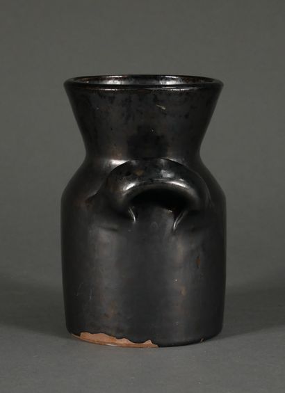 null Robert PICAULT (1919-2000)

Vase with two handles in black glazed terracotta,...