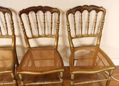 null Four caned chairs with bars in gilded wood (two with damaged caning, wear)