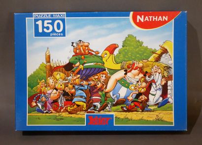 null GOSCINNY - UDERZO 

Maxi puzzle Nathan 150 pieces " Asterix return to the village"...