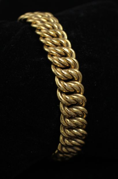 null *Bracelet à maillons creux en or jaune 18k, L : 19 cm., pds : 22,4 g.