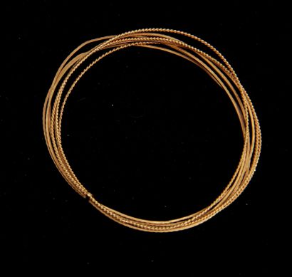null Bracelet-semainier en or jaune 18k, L ; 18 cm., pds : 16 g.