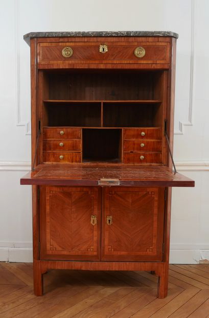 null Satinwood, rosewood and satinwood secretary opening to a drawer, a flap, two...