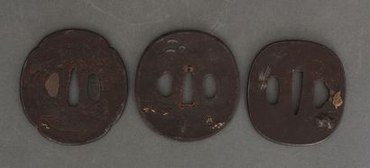 null Three iron tsuba, one, mokko-gata, representing the Sennin Tekkai on one side,...