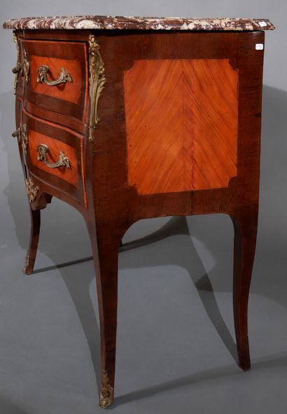 null Regency style chest of drawers, opening with two drawers on two rows separated...