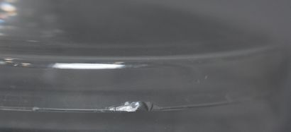 null *Lot :

- DAUM Nancy

Vase ovoïde en cristal taillé, signé

H : 15 cm.

- BACCARAT

-...