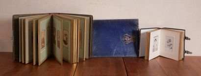 null Two photo albums and a used briefcase embossed in silver metal