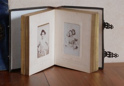 null Two photo albums and a used briefcase embossed in silver metal