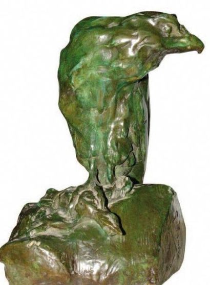 RIGHETTI Guido (1875-1958) Aigle perché sur un rocher tenant un oiseau dans ses serres...