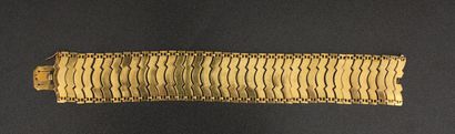null Bracelet à maillons articulés en or jaune 18k, L : 20 cm., pds : 36,5 g.