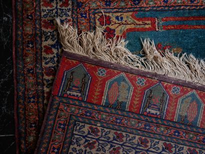 null Galerie en laine à décor polychrome de 7 mihrab dans des médaillons

220 x 84...