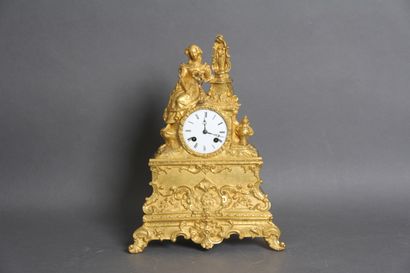 null Gilded bronze clock representing a young woman leaning on an altar, Virgin and...