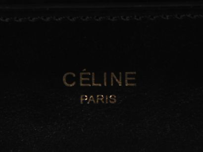 null CELINE Paris
Sac modèle Luggage en veau noir et blanc, double poignée, poche...