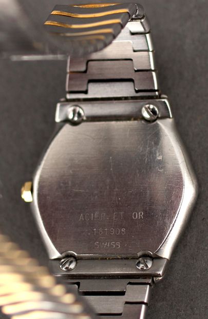 null EBEL
Bracelet-montre de dame en acier et or 18k modèle wave , index sertis de...