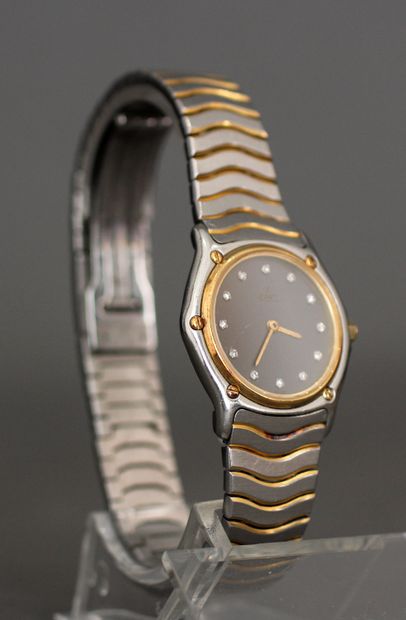 null EBEL
Bracelet-montre de dame en acier et or 18k modèle wave , index sertis de...
