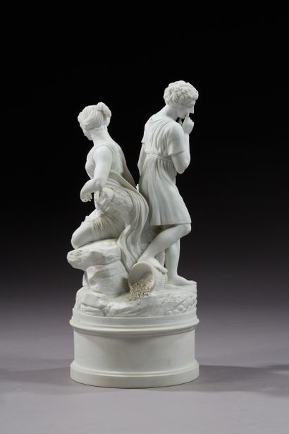 null Centerpiece in cookie porcelain representing Cupid uniting a young couple draped...