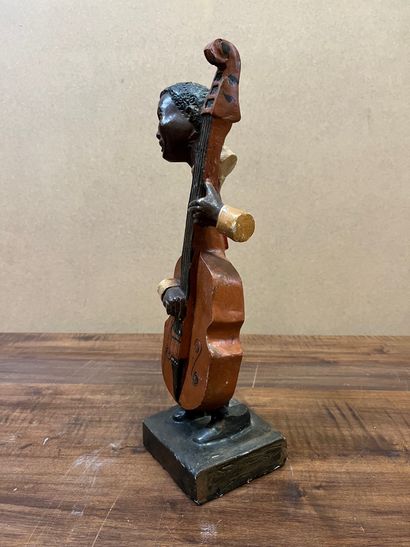 null Sculpture en plâtre polychrome représentant un violoncelliste de jazz
H : 35,5...