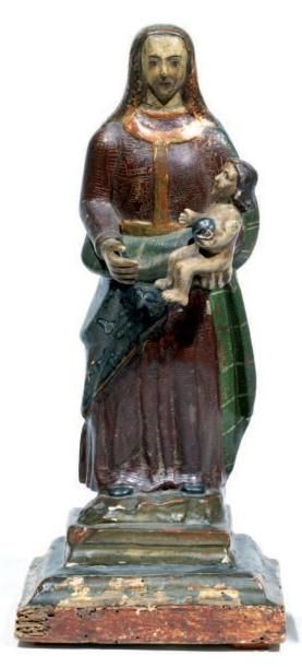null Vierge à l'enfant en bois sculpté et polychrome du XVIIIe siècle. Elle est debout...
