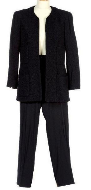 CHANEL CHANEL boutique Veste en laine noire, col cranté, quatre poches plaquées,...
