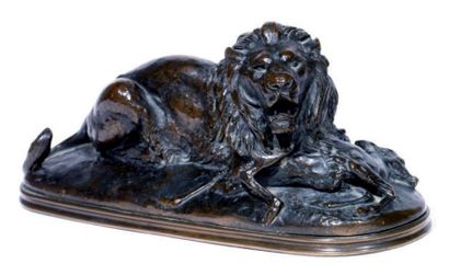Antoine Louis BARYE (1795-1875) Lion tenant un guib Epreuve en bronze à patine brune...