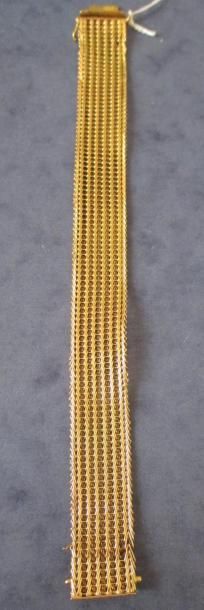 null Bracelet large en or jaune 18 k, pds: 30 g. (accidents)