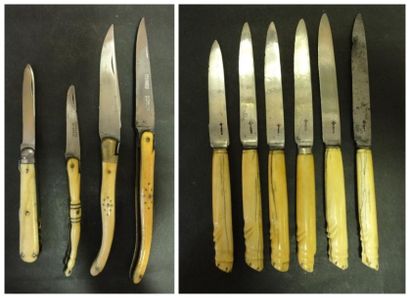 null Lot comprenant: - six couteaux de table, les manches en ivoire (fêles) modèle...