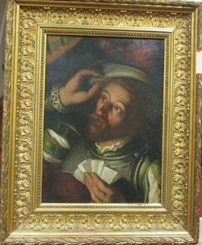 Ecole du XVIIème s Le joueur de cartes (fragment d'un tableau) huile sur toile(*...