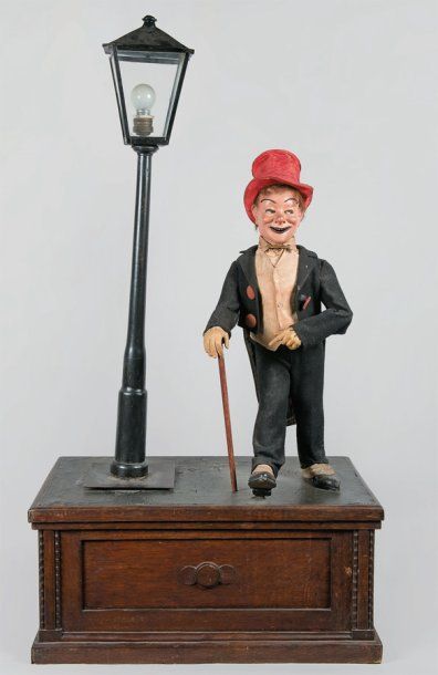 JAF (1930-) GRAND AUTOMATE DE VITRINE PUBLICITAIRE électrique, représentant un dandy...