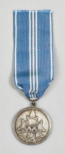 null [Helsinki, 1952] Médaille du mérite olympique en argent avec son ruban remise...