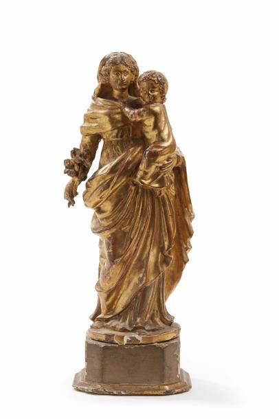 null Vierge à l’enfant en bois sculpté et relaqué polychrome.

Epoque XVIè siècle....