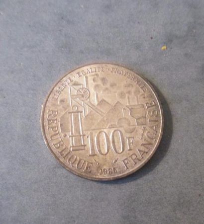 null Une pièce de 100 francs en argent 1985.