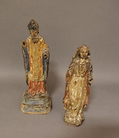 null Deux statuettes en bois (trâces de polchromie)

Pâpe et femme

H : 28 et 23...