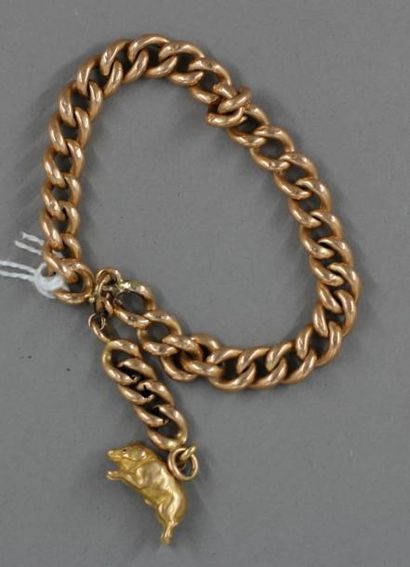 null Bracelet à maillons creux en or jaune 18k orné d'un pendentif en forme de cochon,...