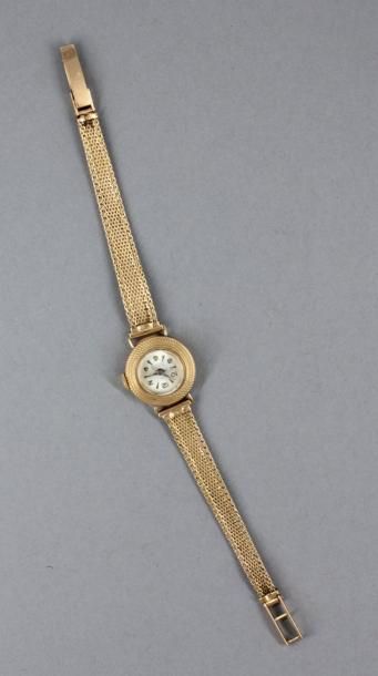 null Bracelet-montre de dame en or jaune 18k, pds brut : 14,3 g.