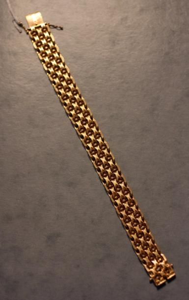 null Bracelet à maillons articulés en or jaune 18k, pds : 51,5 g .