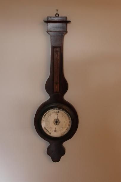null Baromètre-thermomètre en bois de placage, XIXème s.

H : 90 cm. (manques)