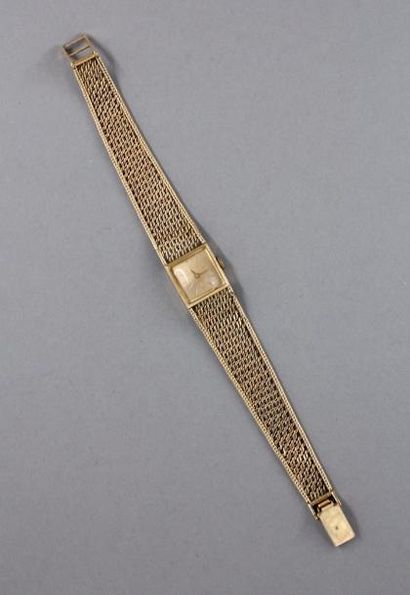 null Bracelet-montre de dame en or jaune 18k, boitier carré, pds brut : 24,7 g. (accident...
