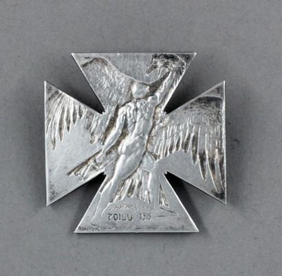 null René LALIQUE

Broche croix en argent 800°/°° à décor gravé d'un homme combattant...