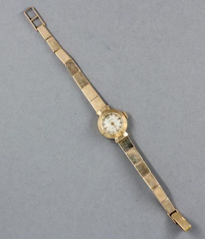 null NOVOREX

Bracelet-montre de dame en or jaune 18k, pds brut : 17,6 g.