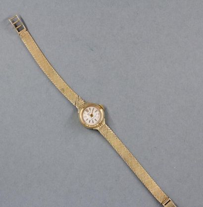 null REGLIA

Bracelet-montre de dame en or jaune 18k, pds brut : 17,6 g. (accidents...