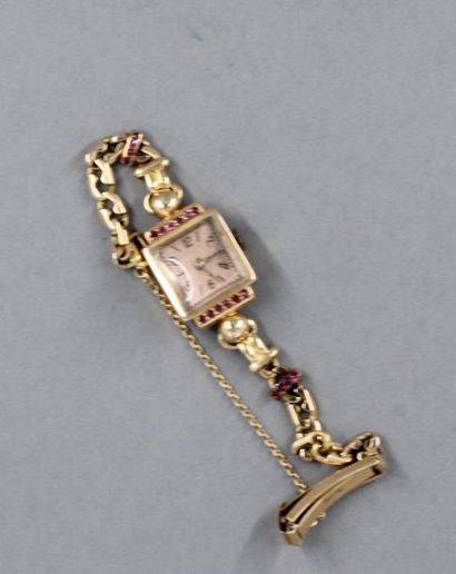 null Bracelet-montre de dame en or jaune 18k et pierres roses, pds brut : 23,1 g...
