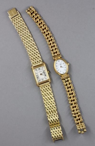 null MICHEL HERBELIN

- Bracelet-montre de dame en métal doré modèle Art Déco à fond...