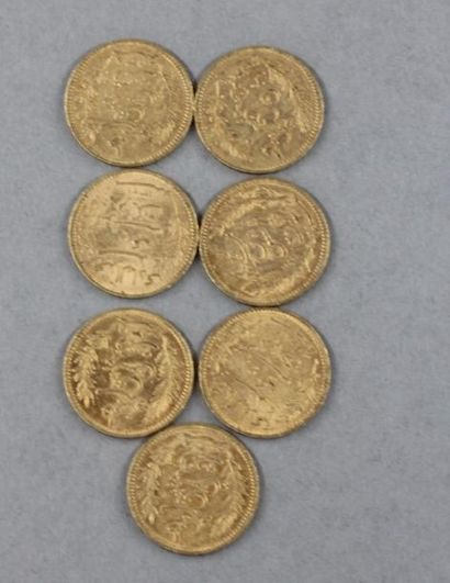 null Sept pièces de 20 francs tunisien en or