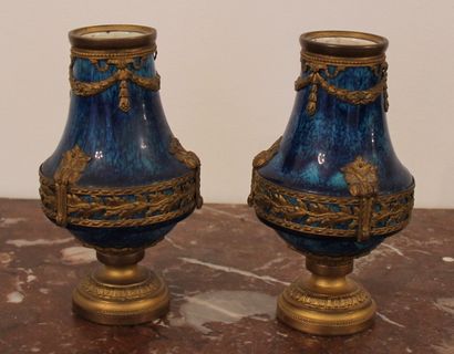 null SEVRES Paul MILLET

Paire de vases en faïence bleue monture en bronze doré

H...